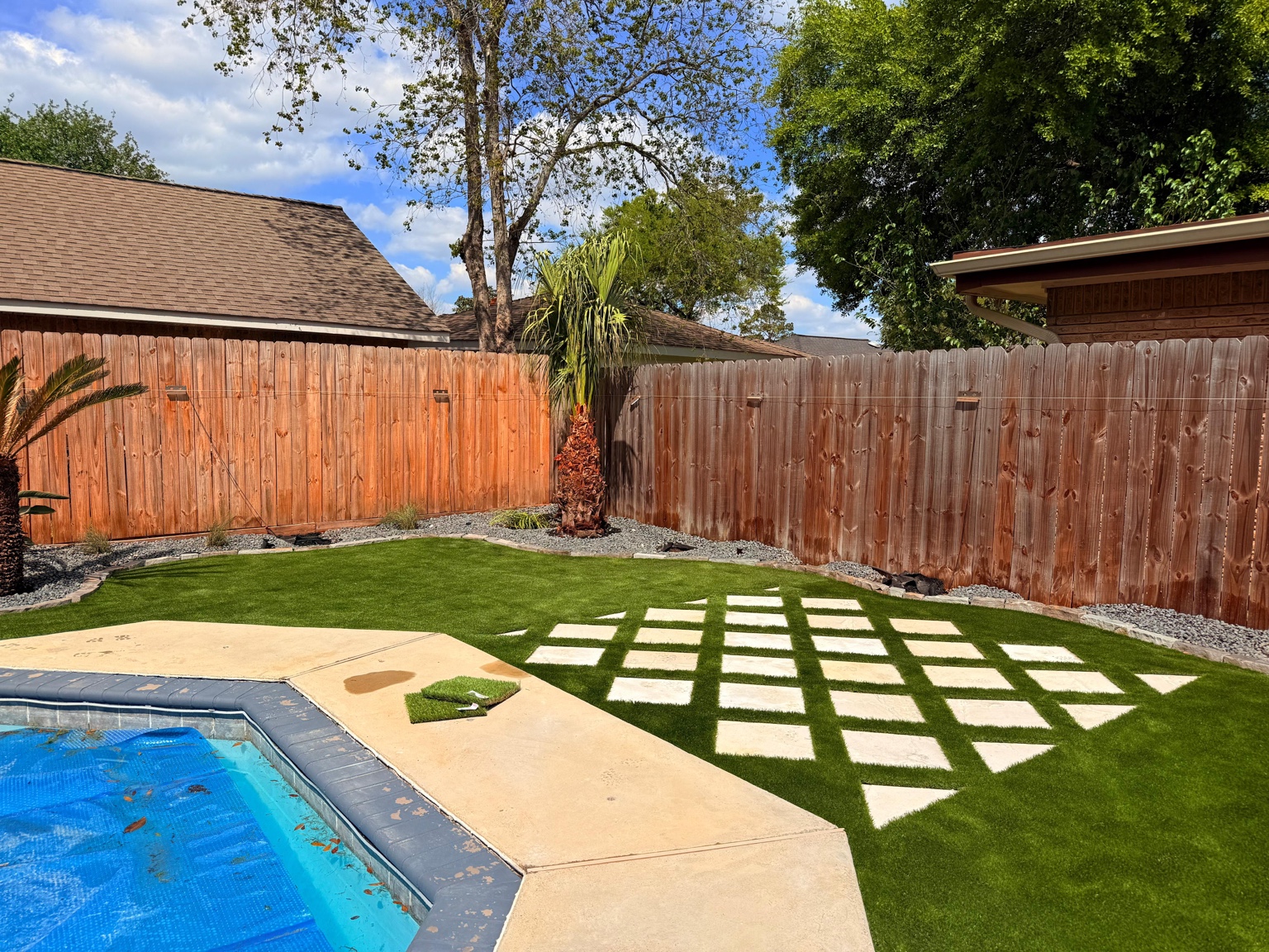Poolside turf with stepping stones