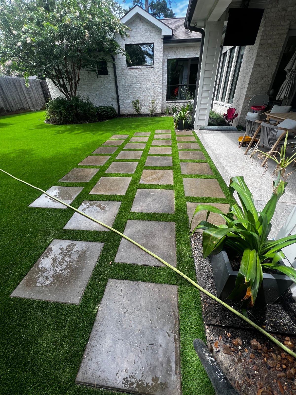 Turf with concrete stepping stones